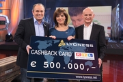 Lyoness CEO Hubert Freidl (right) presents the donation cheque to Birgit Schrowange and Wolfram Kons. Credit: RTL/Hempel. Lyoness CEO Hubert Freidl (right) presents the donation cheque to Birgit Schrowange and Wolfram Kons. Credit: RTL/Hempel.